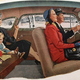 A suspiciously sophisticated grandma from this 50s picture that was posted on Car Talk in a story called Road Trip America
